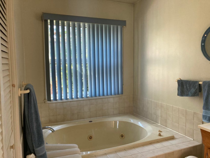 Primary full bath with jet tub.