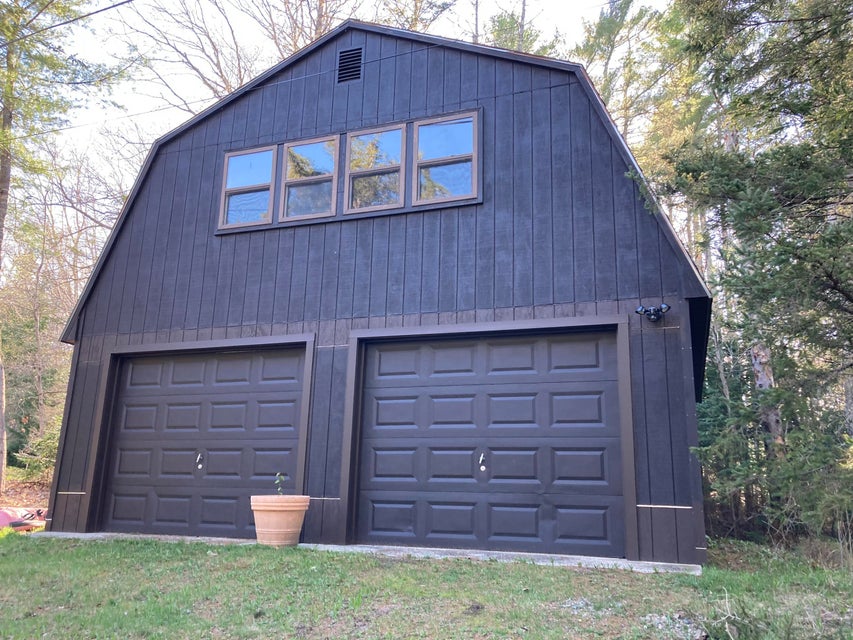 Two car garage w/second floor.
